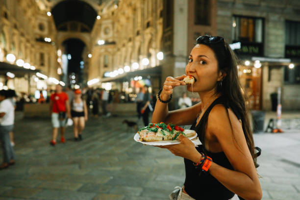 pizza cut on the go in milano - food stock pictures, royalty-free photos & images