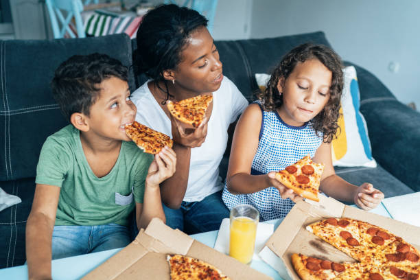 pizza with mum - junk food stock pictures, royalty-free photos & images