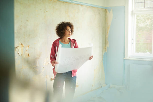 planning her new home - home decoration stock pictures, royalty-free photos & images