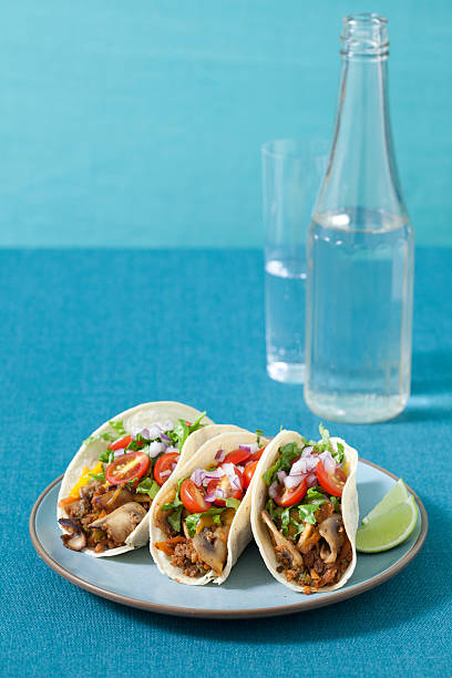 plate of 3 vegetarian barbeque tacos - food stock pictures, royalty-free photos & images