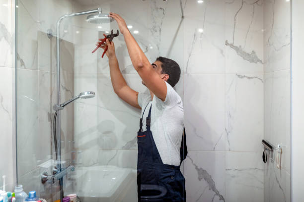 plumber repairing a tap in the bathroom - home decoration stock pictures, royalty-free photos & images