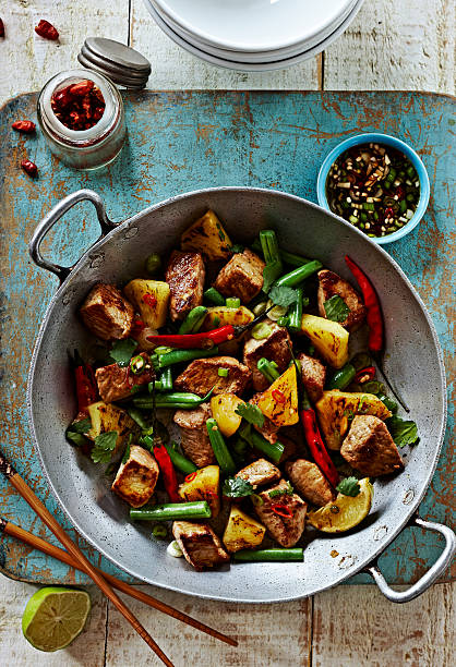 pork and pineapple stir fry with chilli dressing - food stock pictures, royalty-free photos & images