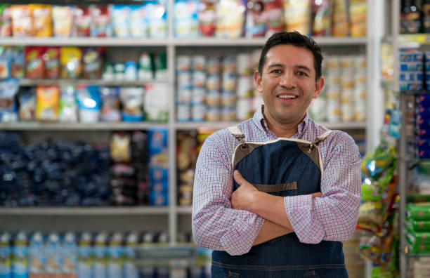 portrait of a man working at a grocery store - food stock pictures, royalty-free photos & images