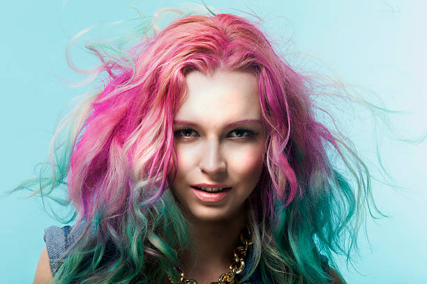 portrait of a woman with colorful hair dye - hairstyle fotografías e imágenes de stock