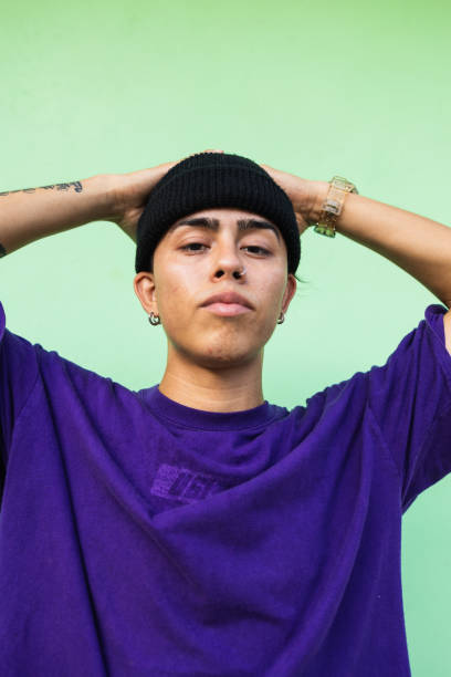 portrait of a young latin man looking at the camera - fashion stock pictures, royalty-free photos & images