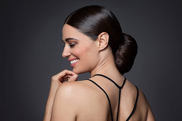 portrait of beautiful woman with brunette hair - hairstyle stock-fotos und bilder
