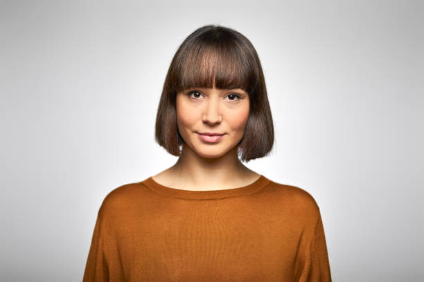 portrait of beautiful young businesswoman - hairstyle stock pictures, royalty-free photos & images