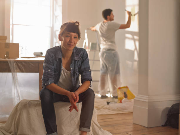 portrait of happy mixed race woman in her new home - home decoration stock pictures, royalty-free photos & images