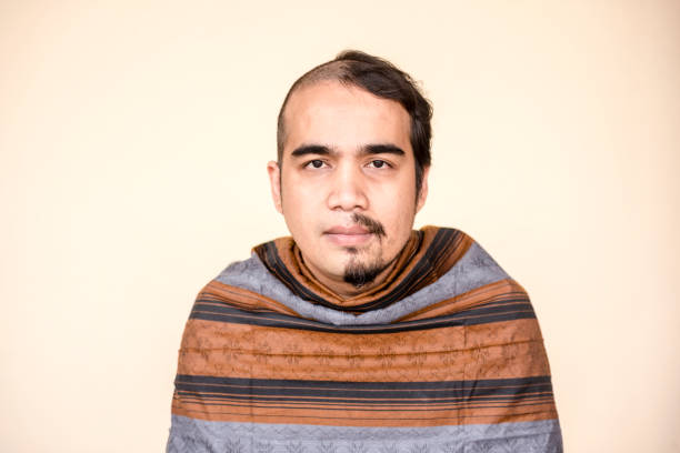 portrait of indonesian man with weird hair - hairstyle stock pictures, royalty-free photos & images