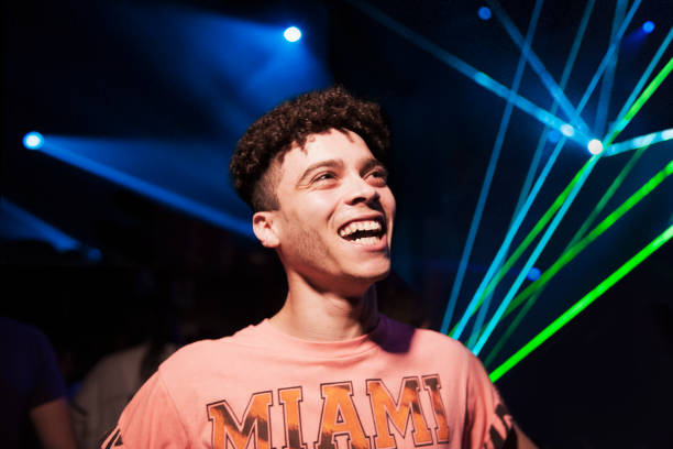 portrait of man having fun at a music event - concert stock pictures, royalty-free photos & images