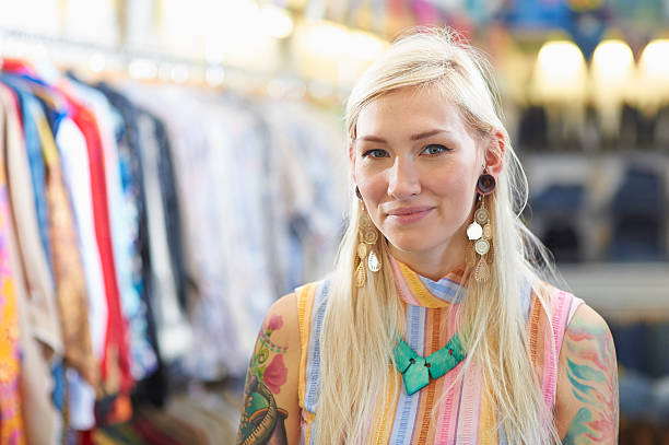 portrait of vintage clothes shop owner. - fashion stock pictures, royalty-free photos & images