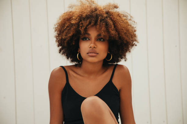 pretty young afro woman - hairstyle stock pictures, royalty-free photos & images