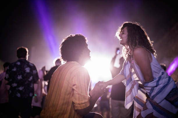 proposal on music festival! - concert stock pictures, royalty-free photos & images