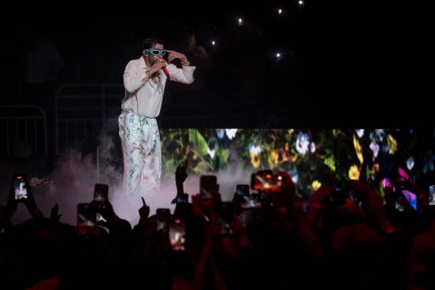 Puerto Rican rapper Bad Bunny performs on stage as part of his three-day "Un Verano Sin Ti" concert at the Coliseo de Puerto Rico in San Juan, Puerto...