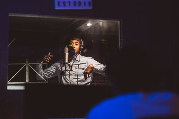 recording studio, recording music singer in booth, producer recording - concert stockfoto's en -beelden