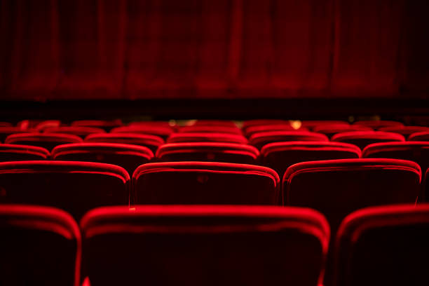 red seats and curtains of an empty theater - concert stock pictures, royalty-free photos & images