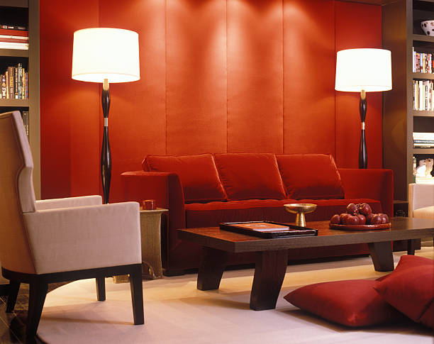 red velvet couch and padded wall in modern living room - home decoration stock pictures, royalty-free photos & images