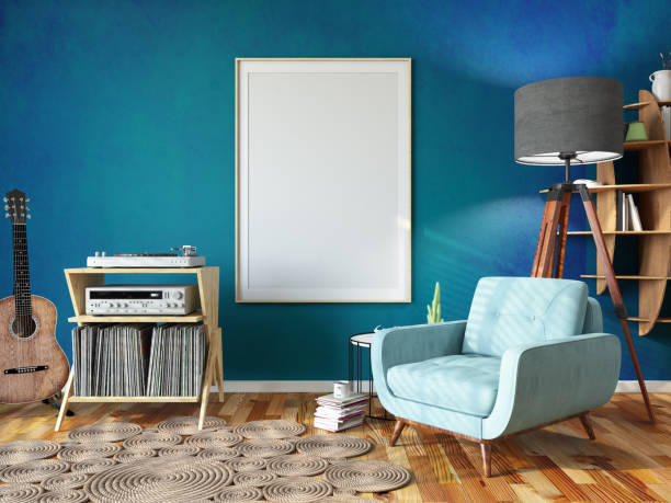 relaxing at home concept with cozy living room full of books armchair music player and a empty picture frame - home decoration stock pictures, royalty-free photos & images