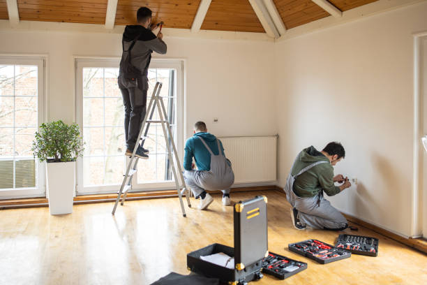 repairman professionals working in client's home - home decoration stock pictures, royalty-free photos & images