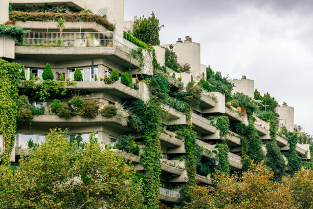 residential concrete apartment building covered with green plants, madrid, spain - garden decoration stock pictures, royalty-free photos & images