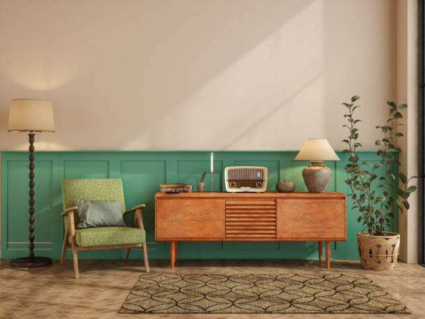 retro living room with green armchair, dresser, floor lamp and potted plant - home decoration stock pictures, royalty-free photos & images