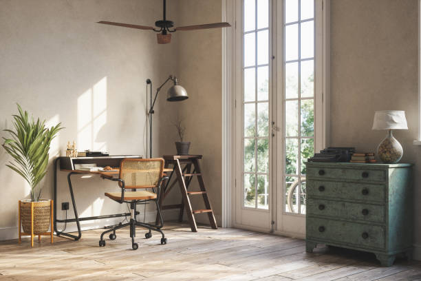 retro living room with study table, floor lamp, drawer, typescript and potted plant - garden decoration stockfoto's en -beelden