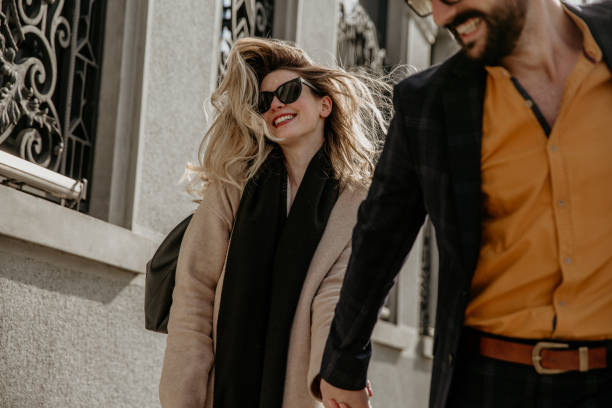 rich and happy people on the street - fashion stock pictures, royalty-free photos & images