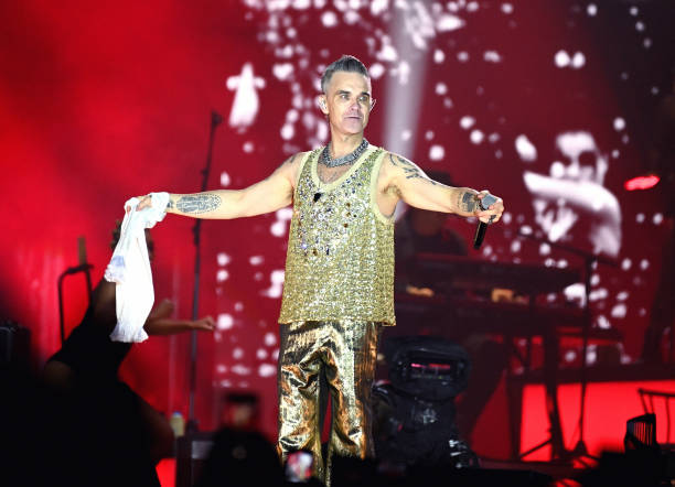 Robbie Williams performs on stage during Heritage Live 2023 at Royal Sandringham Estate on August 26, 2023 in Sandringham, Norfolk.