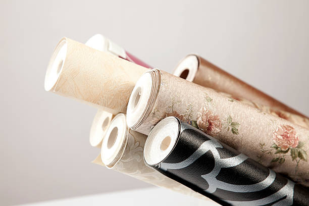 rolls of wallpaper - home decoration stock pictures, royalty-free photos & images