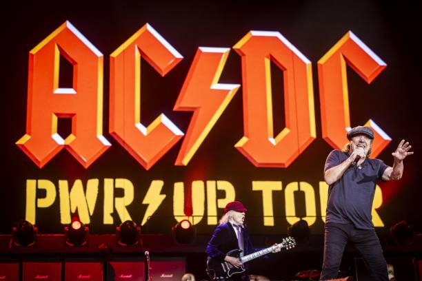S Brian Johnson and Angus Young perform on stage as part of their "Power Up Tour" in the Johan Cruijff Arena in Amsterdam, on June 5, 2024. /...