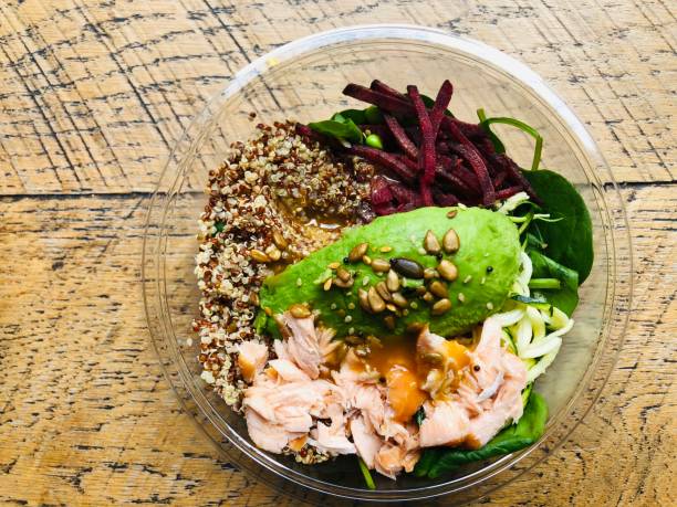 salmon and quinoa salad - junk food stock pictures, royalty-free photos & images