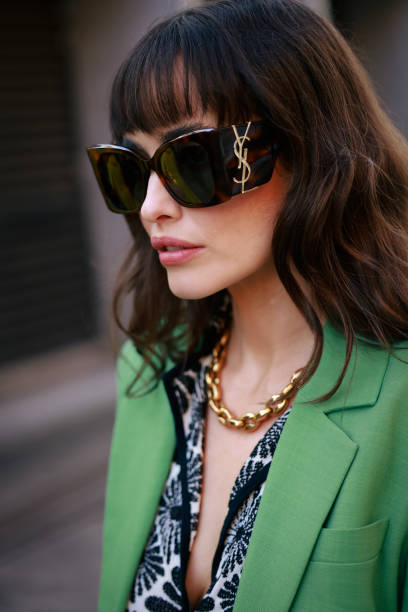 Sarah Stephens wearing green suit, YSL sunglasses and Sandro shirt during Australian Fashion Week Presented By Pandora 2024 at Carriageworks on May...