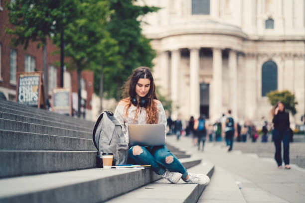schoolgirl in uk studying outside - travel stock pictures, royalty-free photos & images