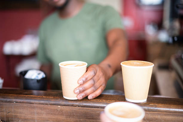 selective focus barista hands take away coffee to customer - junk food stock pictures, royalty-free photos & images