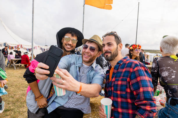 selfies at a music festival - concert stock pictures, royalty-free photos & images