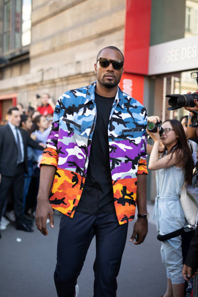 Serge Ibaka is seen on the street during Paris Men's Fashion Week S/S 2019 wearing a multi-color camo jacket on June 20, 2018 in Paris, France.