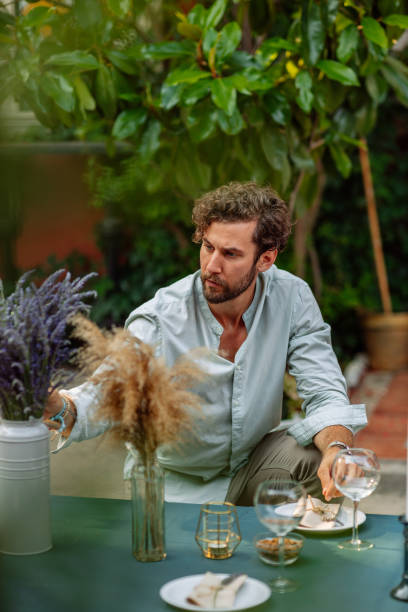 setting up table - garden decoration stock pictures, royalty-free photos & images