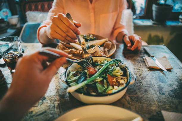 sharing food - food stock pictures, royalty-free photos & images