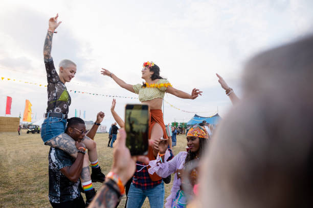 shoulder carry selfie - concert stock pictures, royalty-free photos & images