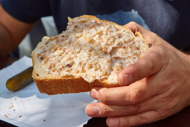 slice of bread with lard - junk food stockfoto's en -beelden