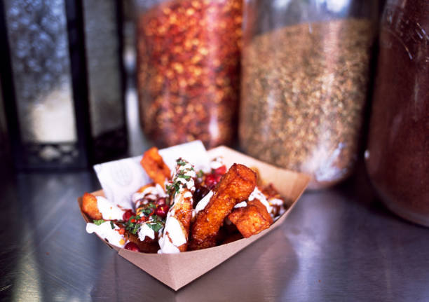 snack box at a outdoor market stall - junk food stock pictures, royalty-free photos & images