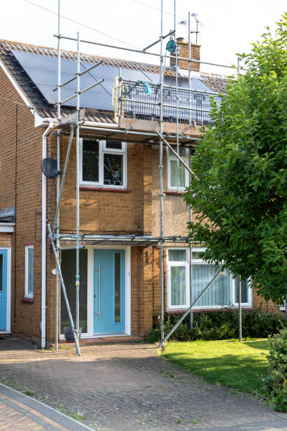 solar panels and scaffolding on a semi-detached house - home decoration stock pictures, royalty-free photos & images
