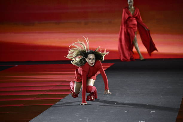 Spanish-Mexican singer and actress Belinda falls down during the presentation of a creation for L'Oreal Paris show "Walk Your Worth" as part of the...