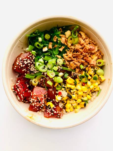 spicy tuna poke bowl - junk food stock pictures, royalty-free photos & images