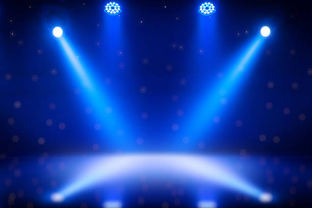 spot lights flares on table or concert stage - concert stock pictures, royalty-free photos & images