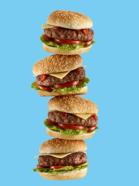stack of hamburgers - junk food stockfoto's en -beelden