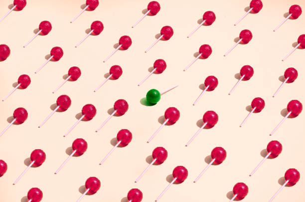 standing out from the crowd - junk food stockfoto's en -beelden
