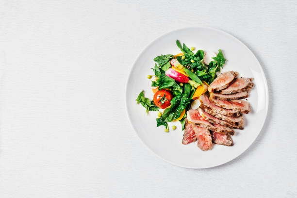 steak with salad - food stock pictures, royalty-free photos & images