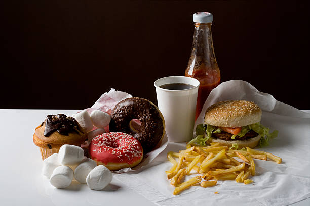 stereotypical american fast food meal and snack food - junk food stockfoto's en -beelden