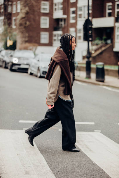 Street style at London RTW Fashion Week on February 19, 2024 in London, England.